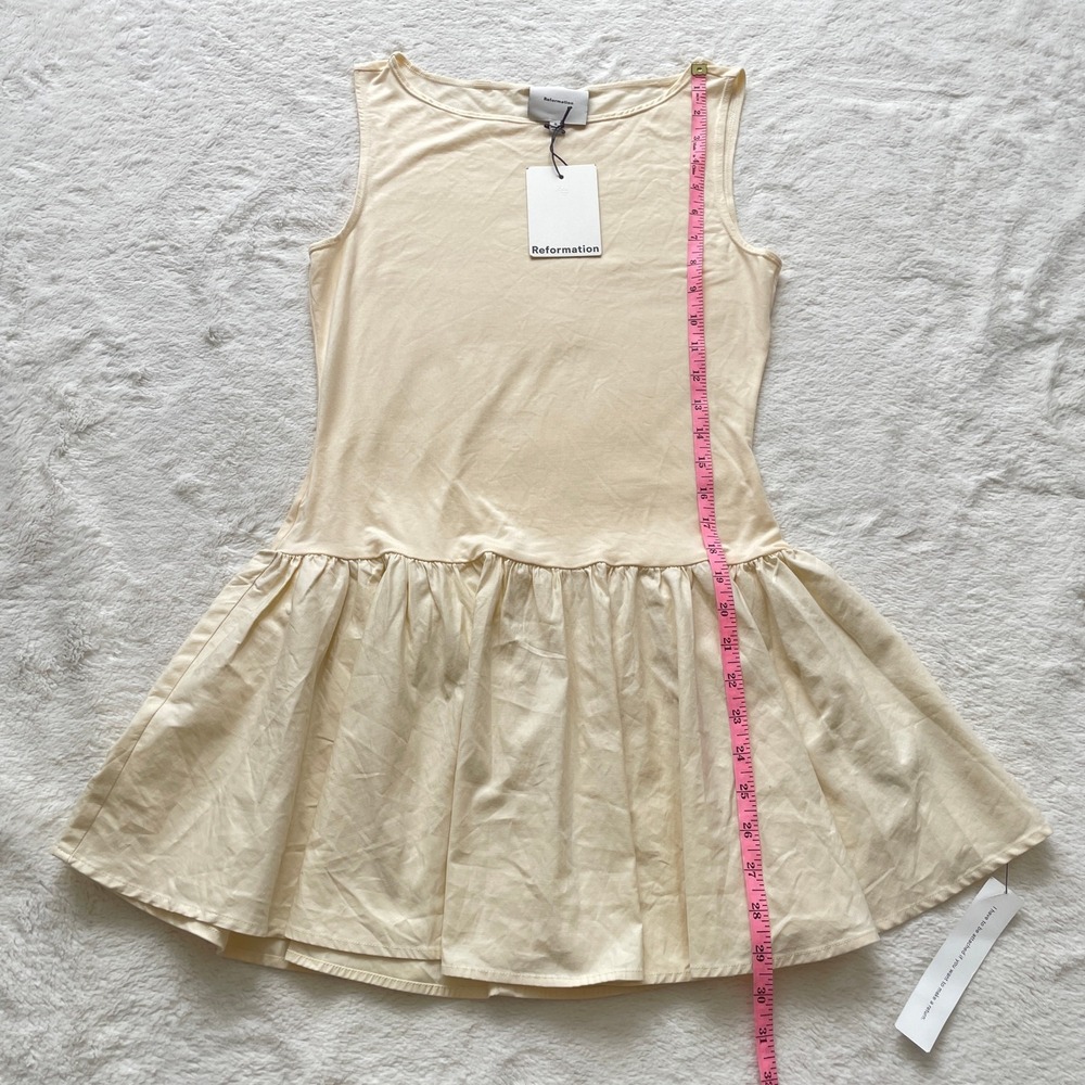 Sleeveless Cream Ruffle-Hem Mini Dress - Picture 9 of 11
